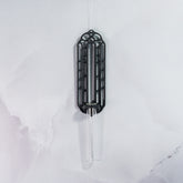 "Front view of empty CARBON Wall Propagation unit, showcasing a single clear tube with a carbon fibre pattern."